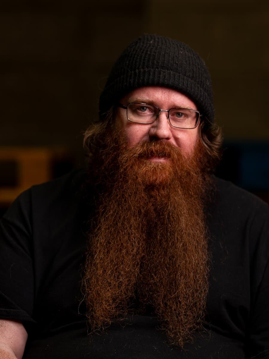 Josh Roe, Quality Control Specialist at Bring Fulfillment, photographed in the Denver warehouse